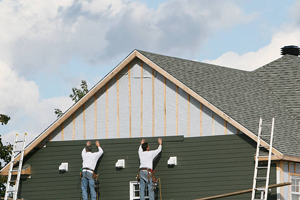 Professional Siding Installation technician working in New Bloomington, OH